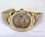 Replica Rolex Day-Date 40mm - Gold Roman Dial Watch - Luminous Markers